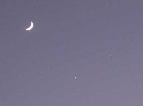 The moon, Venus and Jupiter against a twilit sky